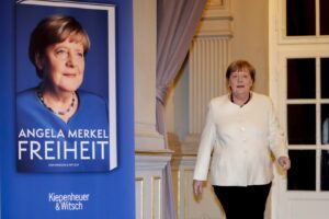 Former German Chancellor Angela Merkel arrives for the presentation of her memories in Berlin, Germany, Tuesday, Nov. 26, 2024. Book title reads "Freedom".