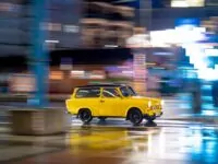 Gelber Trabant in den Straßen von Dresden, Foto: ČTK/DPA/Jens Büttner