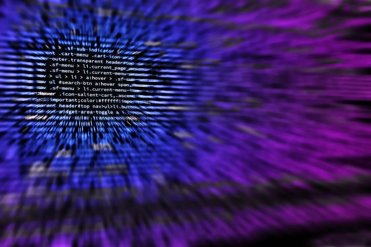 Auf einem Bildschirm ist der Ausschnitt eines Programmcodes zu lesen.